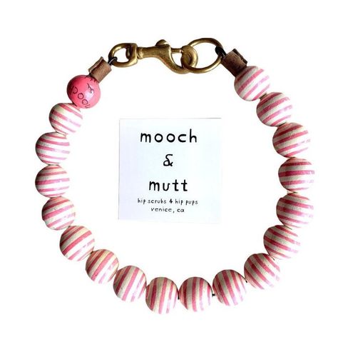 STRIPES (PRETTY IN PINK) Make a statement with this Colourful Hand painted WOODEN BEAD durable Collar! For the MOST HIP dog in town.  Built to last not just to look good! solid Brass Snap hook and O ring.  Mooch and Mutt    Give your PUP some LOVE with The STRIPE Collar ! As UNIQUE as your DOGGY ❤️ Hand painted wood beads that are strung on 300 tensile strength aerospace wire. Solid Brass snap hook and O ring not only looks good but is durable and weather proof!  Collar is made to wear for even the dogs that like to pull!  Most beads are between 18-20 mm  Painted and coated Virtually Indestructible!!   IMPORTANT ⚠️ SIZING INSTRUCTIONS  1. Use a cloth tape measure   2. Measure around the middle of the neck where you want collar to hang. Please measure snuggly. Not loose. I will add the amou Beaded Dog Collar Diy, Diy Dog Collar, Collars Diy, Beaded Dog Collar, Diy Collier, Wooden Bead Necklaces, Cloth Tape, Ring Der O, Beaded Collar