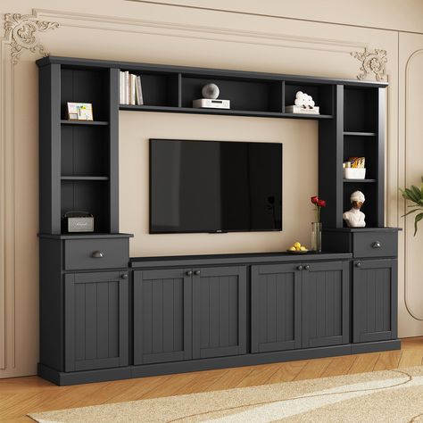 PRICES MAY VARY. [All in One TV Stand]: The modern TV cabinet wall unit is suitable for TVs up to 75 inches and comes with 4 sections. Integrate a TV cabinet, bookshelf, and wine cabinet into one to create a personalized storage living room. [Large Storage Space]: This wall unit TV cabinet features a stylish shape and color scheme that perfectly blends into any room style. There are 9 open shelves, 2 drawers and 4 cabinets with adjustable shelves to easily store audio and video equipment. [High Tv Console Modern, Tv Stand Set, Large Tv Stands, Entertainment Wall Units, Space Tv, Black Tv Stand, Entertainment Wall, Tv Stand Console, Rack Tv