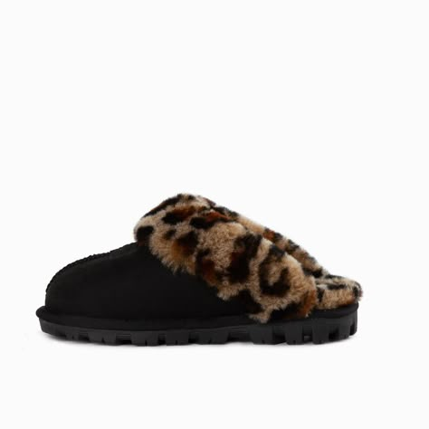 Ugg Coquette Slipper (Leopard Print)(Water Resistant) Stay cozy and stylish with the Ugg Coquette Slipper in Leopard Print. Made with high-quality materials, these slippers are perfect for lounging around the house or running quick errands. The leopard print design adds a touch of flair to your everyday look. Not only are these slippers fashionable, but they are also water-resistant. This feature ensures that your feet stay dry and comfortable, even on rainy days. The durable construction and st Leopard Print Slippers, Cheetah Print Uggs, Leopard Uggs, Ugg Coquette Slippers, Ugg Coquette, Leopard Slippers, Leopard Print Shoes, Black Uggs, Simple Shoes