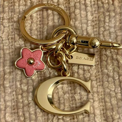 Nwt Coach Signature "C" Bag Charm Plated Brass & Resin Keychain/ Key Fob / Bag Charm. Brand New & 100% Authentic! Style: #. Color: Im / Gold Brass & Rose Resin And Metal Attached Split Key Ring And Dogleash Clip Cute Girly Keychains, Cute Keychains For Car Keys And Wallet, Coach Bag Charms, Keychain Aesthetic Car Keys, Coach Bag Charm, Cute Etsy Finds, Backpack Accessories Keychain, Cute Car Keys Keychains Ideas, Key Ring Aesthetic