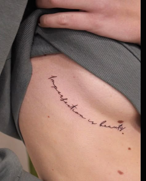 Thigh Phrase Tattoos Women, Underbreast Tattoo Writing, Sternum Word Tattoo Women, Beautifully Imperfect Tattoo, Imperfections Tattoo, Underboob Quote Tattoo, Underboob Word Tattoo, Imperfection Is Beauty Tattoo, Rib Script Tattoo