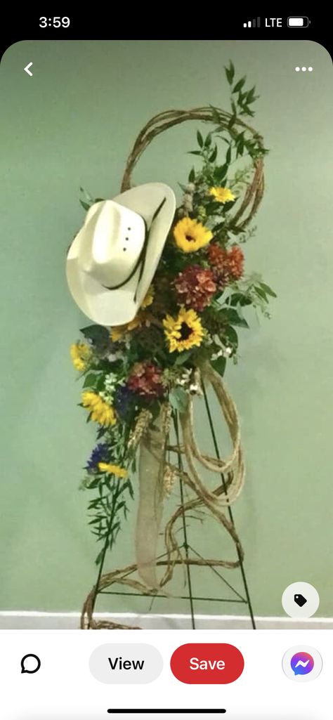 Ranchero Centerpiece Ideas, Texas Floral Arrangements, Tractor Flower Arrangement, Cowboy Flower Arrangement, Cowboy Hat Floral Arrangement, Western Flower Arrangements, Western Floral Arrangements, Cowboy Hat Centerpiece, Cowboy Boot Centerpieces