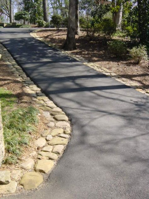 asphalt with river rock edge Stone Lined Driveway, Paved Driveway Edging, Driveway Ditch Ideas, Driveway Lining Ideas, Asphalt Walkway To Front Door, Asphalt Driveway Edging Ideas, Driveway Expansion Ideas, Asphalt Walkway, Asphalt Driveway Ideas