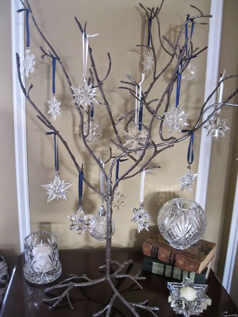 One of my favorite holiday decorations is my Swarovski Snowflake/Star tree         Since their introduction in 1991, the Swarovski Annual ... Swarovski Crystal Christmas Tree, How To Display Swarovski Snowflakes, Swarovski Christmas Tree, Swarovski Ornaments, Swarovski Snowflake, Blue Icicle Suncatcher Ornament, Swarovski Christmas, Star Tree, Crystal Snowflakes