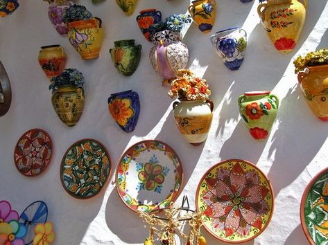 10 Most Popular Souvenirs In Spain | Trip101 Spanish Souvenirs, Spain Souvenirs, Decorative Ceramics, Spanish Holidays, Hobbit Hole, Booth Design, Ceramic Decor, Bring Back, The Hobbit