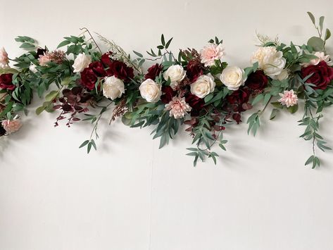 "Size the length of the garland is about 160cm / 240cm / 320cm (optional) the length of the garland is about 5.5ft / 8\" / 10ft (optional) Flowers & Foliages rose, dahlia, peony, eucalyptus, etc. Colors burgundy, blush pink, sage green, ivory white, etc. Material silk flowers, faux foliage, etc. * Please kindly note that my shop is based in China, so all the flower works in my shop will be shipped abroad. *" Sage Green And Burgundy Wedding Decor, Ivory Sage Wedding, Sage Wedding Arch, Burgundy Blush Pink And Sage Green Wedding, Blush Maroon Sage Wedding, Sage Green Burgundy Pink Wedding, Burgundy And Blush Wedding Arch, Burgundy Runner Wedding, Sage And Burgundy Wedding