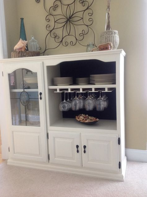 A Wine Bar Lori King at Pinterest has shared a wonderful repurposing idea of an old TV cabinet. Simply paint it and add a wine glass rack to a shelf and turn it into a wine bar. A Kids’ Play Kitchen Debbie Williams at eHow has shared a cute creation made from an upcycled TV Old Tv Cabinet, Vintage Stereo Cabinet, Old Entertainment Centers, Repurposed Dresser, Entertainment Center Makeover, Wooden Tv, Diy Tv Stand, Entertainment Cabinet, Entertaining Decor