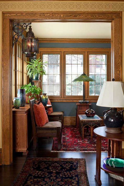 Navy-blue walls work in the bright sunroom; the table lamp by the window is by Century Studios. Craftsman Interior Design, Craftsman Home Interiors, Arts And Crafts Interiors, Craftsman Interior, Minimalist Living Room Decor, Craftsman Home, Arts And Crafts House, 카페 인테리어 디자인, Craftsman Style Homes