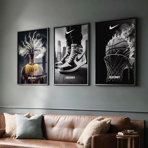 Bring the energy of the court to your home with these dynamic sports prints. Perfect for adding a modern, athletic touch to your space!" #SportsDecor #WallArt #ModernDecor #BasketballArt #SneakerHead #InteriorDesign #HomeInspo #ManCaveDecor #AthleticStyle #BoldInteriors #ArtInspo #NikeInspired #DecorGoals #SportsVibes #CreativeSpaces Just Do It Poster, Poster Nike, Nike Motivation, Nike Poster, It Poster, Poster Set Of 3, Quote Black, Motivation Poster, Motivational Quote