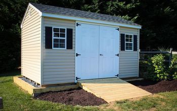 I've wanted my own version of a She Shed for a few years. With my guy's mad carpentry skills, it all came together and I love it! Close to finished, added front stoop, lattice along the base and some flashing above. She Shed: humble beginnings She Shed: ready for a dance party This is the extant (mostly) of the new materials used, cedar frame and deck boards (Home Depot) for the floor, roof is corrugated plastic (Menards) Front door and 4 windows all reclaimed (view of fron… Shed Ramp, Small Shed, Vinyl Sheds, Shed Building, Wood Shed Plans, Shed Floor, Cheap Sheds, Wood Storage Sheds, Simple Shed