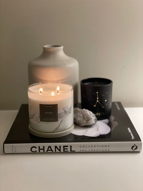 Fashion Books Decor Aesthetic, Books Candles Aesthetic, Chanel Books Decor, Chanel Aesthetic Room Decor, Chanel Room Aesthetic, Book Candle Aesthetic, Chanel Living Room Decor, Book And Candle Aesthetic, Books And Candles Aesthetic