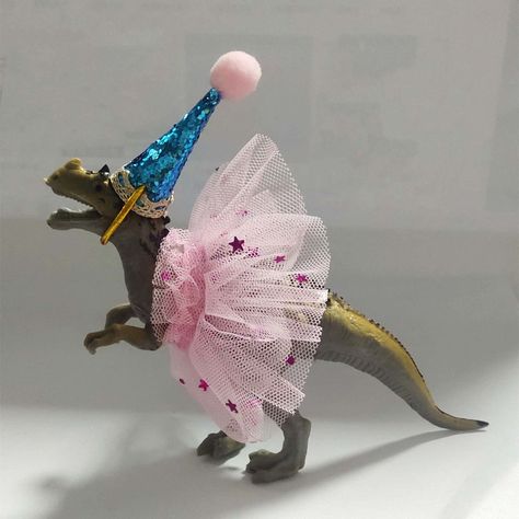 PRICES MAY VARY. ✨The allosaurus dinosaur cake topper included:1pcs x allosaurus dinosaur, 1pcx party animal hats, 1pcx handmade tutu dress . Size is same as picture. Handmade products cannot be 100% perfect. If you are very strick with the quality, pls thick twice before ordering. ✨Material: the allosaurus dinosaur with tutu and party hat cake topper are made of non-toxic plastic and BPA-free material, safe for children. The cute unique party dinosaur figures with tutu is solid with hand-made c Girly Dinosaur Party Games, Flower Crown Dinosaur, Dinosaur And Unicorn Christmas Tree, Dino Art Party, Girls Dinosaur Birthday Party Amazon.com, Dinosaur Dress Birthday, Birthday Crown Dinosaur, Dinosaur Cake Party Hat, Sibling Birthday Party Brother Sister Dinosaur