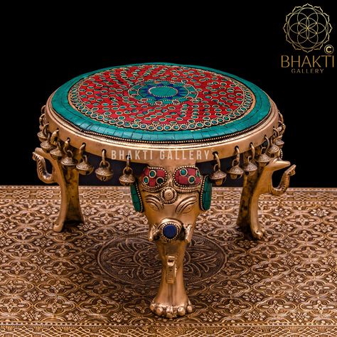 Brass Round Chowki with Elephant Pillars and Bells with Mosaic Stone work, Brass Pooja Chowki for Home Temple, Religious Home Decor. #brassidolsstand #statueidolchowki #brassstoolchowki #brassbajotchowki #bronzepoojachowki #brasschowkitable #brasspujachowki #brassindianchowki https://etsy.me/3uui5vw Diwali Temple Decoration, Pooja Items Products, Artifacts For Home Decor, Pooja Chowki, Saraswati Statue, Temple Decor, Diy Diwali Decorations, Silver Pooja Items, Ethnic Home Decor