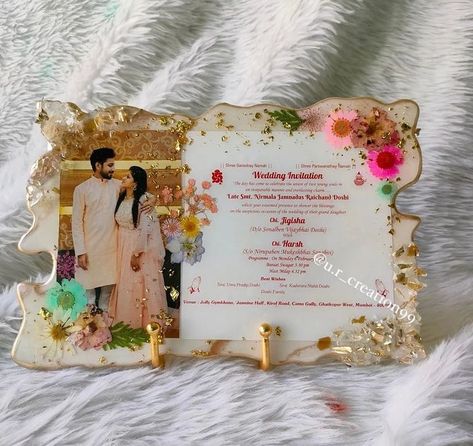 Resin wedding card preserve🌸 Dm to order Customise available . #wedding #weddingcard #weddingseason #resinart #cardpresentation #festive #resin #resinartwork #resinartist #resincraft #resinpour #trending #viral #handmade #foryou #forsale Wedding Card Preservation, Resin Kankotri, Resin Wedding Card, Resin Invitation Card, Resin Photo Frame Ideas, Raisin Art, Wedding Card Decorations, Diy Resin Gifts, Resin Wedding