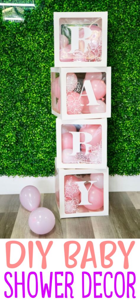 Having a baby shower? We have got a fantastic idea for some DIY baby shower decor. With these balloon boxes you can make adorable, affordable baby shower decorations that you are going to love.This custom baby shower decor is sure to have all your guests raving about how talented you are! You could easily adapt it for other party themes too – graduation, birthday, anniversary, and more. Baby Shower Boxes Decorations, Baby Shower On A Budget Girl, Diy Baby Blocks Decoration, Baby Boxes Decorations, Display Baby Shower Ideas, Baby Blocks Baby Shower Diy, Cricut Baby Shower Decorations, Easy Diy Baby Shower Decorations, Baby Shower Cricut Ideas