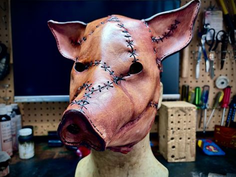 This lil piggy went to the butcher… 😳 Finished up this pig mask and shipped it off to its new home today. Made using veg tan cowhide leather, dyes, paints, thread, wax and sealants #leather #mask #pig #pigmask #halloweenmask #movieprop #prop #costume #costumedesigner #sooke #sookebc #skinznhydez #mrhydezemporiam Pig Mask Diy, Pig Mask Aesthetic, Pig Monster, Pig Mask Creepy, Pig Skull, Pig Mask, Mascaras Halloween, The Butcher, Leather Mask