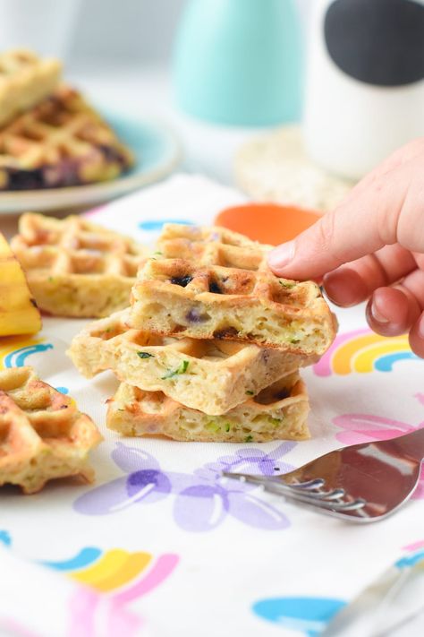 This Baby Waffle Recipe are healthy Banana Oatmeal Waffle recipe filled with grated zucchini and blueberries. It's an healthy baby led weaning recipe for kids starting to eat solid. Plus, these banana waffles are also egg-free and dairy-free to avoid food allergies. Baby Waffle Recipe, Baby Waffles, Zucchini Waffles, Healthy Banana Oatmeal, Waffle Recipe Healthy, Oatmeal Waffles, Baby Led Weaning First Foods, Breakfast Recipes Kids, Zucchini Banana