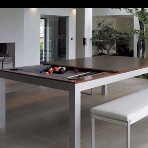 Modern dining table with a hidden, convertible pool table underneath. http://coolpile.com/home-stuff-magazine/fusion-dining-table-converts-pool-table-seconds/ Dining Table Pool Table Combo Modern, Dining Pool Table With Top, Pool Table In Tight Space, Pool Table Tennis Dining Table, Used Pool Tables, Pool Table Table Tennis, Outdoor Pool Table, Pool Table Dining Table, Basement Makeover