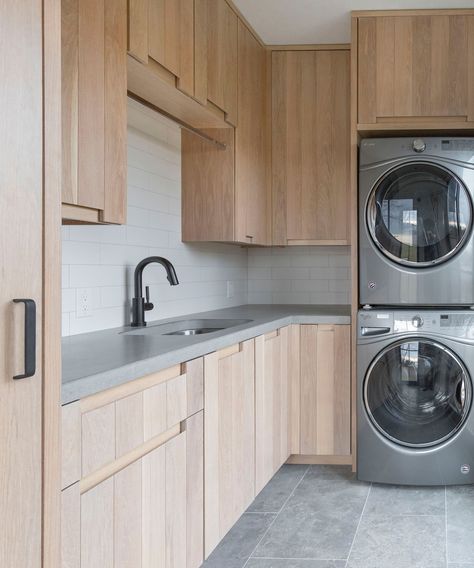 Who says the kitchen can't be the powerhouse of cleaning? The unique Washer/Dryer combo adds to the modern sleekness of the natural wood finish while emphasizing the potential productivity of a traditional space. Kitchen With Washer And Dryer, Black Washing Machine, Mini Laundry, Farmhouse Guest Bedroom, Jack Of All Trades, Farmhouse Front Porches, Cottage Exterior, Homestead Living, Washer Dryer Combo