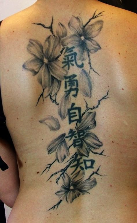 Chinese flowers tattoo on back Chinese Flower Tattoo, Tattoos And What They Mean, Chinese Letter Tattoos, Letters Tattoo, Tattoo Son, Flower Spine Tattoos, Chinese Symbol Tattoos, Tato Minimal, Chinese Flowers