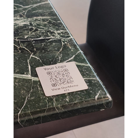 This Stainless Metal QR Code Table Plate adds a touch of sophistication to your dining space, seamlessly blending with any decor. Ideal for restaurant, coffee shop, hotel, patisserie, or bakery. Use them to display your QR code for Menu, Reviews, Social Media, WiFi, Ratings and more. 
Square shaped with oval corners designed for durability and easy cleaning, simply wipe them down with a semi wet cloth. Keep in mind that we can print in colour too. Qr Menu Restaurant, Qr Menu Design, Qr Code Restaurant, Menu For Restaurant, Alpine Hotel, Table Plates, Table Plate, Menue Design, Restaurant Social Media