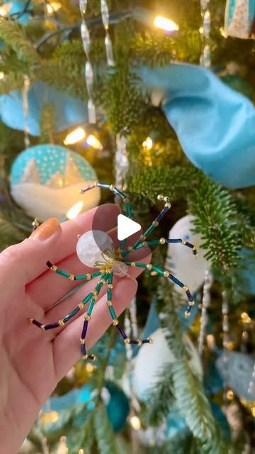 Tanya | Decor, DIY & Thrifting on Instagram: "There’s a legend about tinsel + spiders!⁣⁣
⁣⁣
So here’s how to make your own beaded Christmas spider ornament to hide among the branches.⁣⁣
⁣⁣
As far as my DIY ornament tutorials go, I’ll admit this one is a little quirky! But it’s a fun Christmas tradition that goes along with tinsel. ⁣⁣
⁣⁣
If you make your own DIY beaded spider ornament, I’d love to see!!⁣⁣
⁣⁣
#diyornament #diyornaments #christmasdecor #christmasdecorations #christmasornaments #christmasornament #diychristmasdecorations #diychristmasornaments #handmadechristmasgifts #handmadechristmas #ornaments #vintagechristmas #vintagechristmasornaments #tinseltree" How To Make A Christmas Spider, Spider Ornament, Christmas Spider, Tinsel Tree, Beaded Spiders, Diy Ornament, Ornaments Homemade, Beaded Art, Christmas Tradition