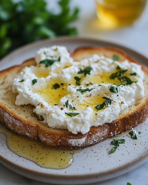 This easy Sourdough Toast with Ricotta and Honey is a game-changer for breakfast! It’s creamy, sweet, and oh-so-delicious. You just can't go wrong with this combo!  For a delicious crunch, toast your sourdough until golden brown, then spread creamy ricotta cheese over the top. Drizzle with sweet honey for that perfect finish!  Ingredients:  - Sourdough bread - Ricotta cheese - Honey   For the detailed recipe and more toppings ideas, Link in first comment [👇] [👇]  This toast is a total crowd-pleaser! Everyone will be asking for more.   #SourdoughToast #RicottaCheese #BreakfastIdeas #EasyRecipes #SweetAndSavory Sourdough Toast Toppings, Sourdough Bread Toppings Ideas, Sourdough Toast Ideas, Ricotta And Honey, Toast Sourdough, Honey Breakfast, Sourdough Toast, Bread Toppings, Ricotta Toast