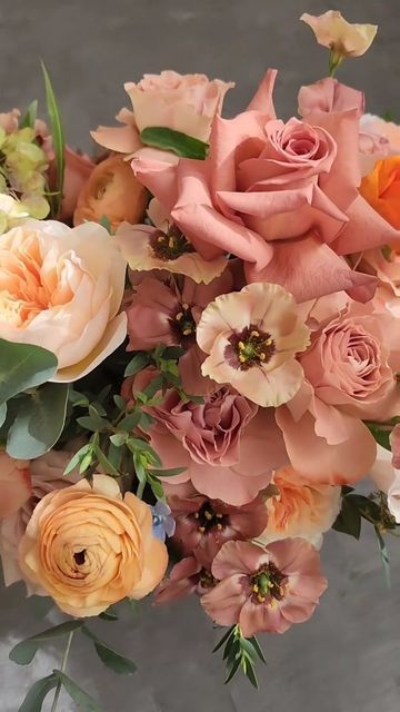 Yena Song on Instagram: "A vibrant medley of peach, blush, cappuccino, orange, light blue, and white blooms comes together in a stunning celebration of color. 

Tied with a satin ribbon, the bouquet is not just an accessory but a kaleidoscope of hues, embodying the spectrum of emotions that make a wedding day unforgettable. 

It's a bouquet as diverse and beautiful as the love it represents. 🍑💖☕🍊💙🤍 

#flower597 #WeddingFlowers #weddingtoronto" Light Orange Flower Bouquet, Salmon Wedding, Blue Flowers Bouquet, Spring Weddings, Flower Inspiration, Peach Blush, Wedding Flower Inspiration, Orange Light, Peaches Cream