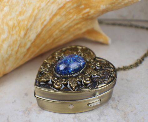 🎶 Unlock your inner melodies with our stunning Sapphire Blue Opal Music Box Locket! 🎵 This exquisite piece is now available for only $100.00 💙✨ Don't miss out on the chance to add this unique locket to your collection 🌟 #musicbox #jewelry #locket #sapphireblue #opal #melodies #accessories #fashion #limitededition #musthave #sale Shop Now https://bit.ly/3xA0KSg Music Box Necklace, Music Box Locket, Girlfriend Necklace Gift, Heart Music, Floating Diamond Necklace, Box Necklace, Heart Shaped Pendant Necklace, Music Box Jewelry, Heart Necklace Diamond