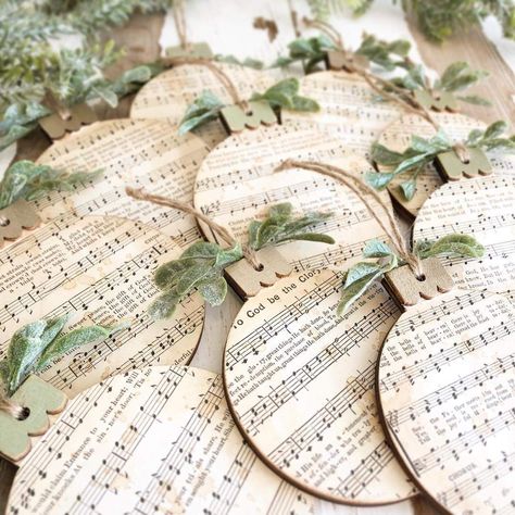 Song Sheet Crafts, Diy Ornaments Farmhouse, Hymn Ornaments Diy, Hymn Christmas Ornaments, Round Flat Christmas Ornaments, Craft With Sheet Music, Musical Ornaments Diy, Decorating With Sheet Music, Christmas Music Decorations