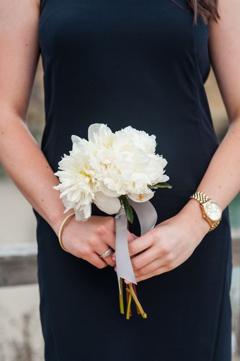 The mothers will carry petite bouquets of white peonies, white waxflowers, and seeded eucalyptus wrapped in nude ribbon with the stems showing. Single White Flower Bouquet, Mother Of The Bride Mini Bouquet, Small Bouquet For Mother Of The Bride, Mother Of The Bride Bouquet, Entourage Flowers, Mother Of The Bride Flowers, Bouquet Shapes, Simple Bridesmaid Bouquets, Bridesmaid Dress White