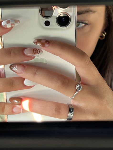 nails, acrylic nails, fake nails, brown, white, nail art, smiley face nails, rings, silver rings Nail Pics In Car, Nails In Car Pic, Brown Smiley Face Nails, Nail Mirror Selfie, Aesthetic Nail Poses, How To Show Off Nails In Photos, White Smiley Nails, Selfie With Nails, Smiley Face Nails Aesthetic