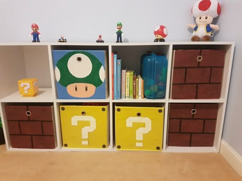 Mario Storage Cubes, Mario Cube Shelf, Super Mario Playroom, Mario Kart Bedroom Ideas, Mario Nursery Theme, Super Mario Kids Room, Super Mario Room Ideas, Mario Brothers Bedroom Ideas, Super Mario Bros Bedroom Ideas