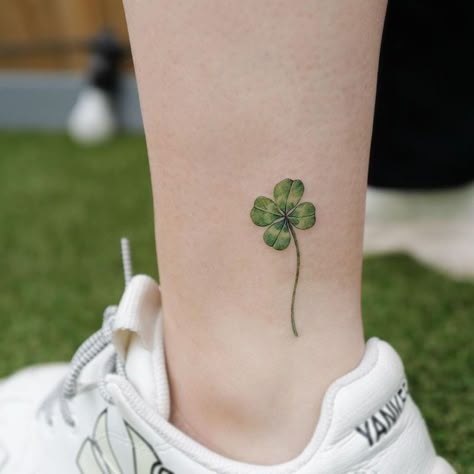 Small Irish Tattoos, Inside Ankle Tattoos, Nemo Tattoo, Beautiful Spine Tattoos, Leaf Clover Tattoo, Word Tattoo Ideas, Four Leaf Clover Tattoo, Spine Tattoo Ideas, Clover Tattoo