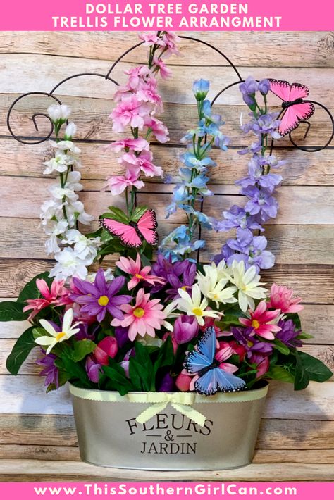 Dollar Tree Garden Trellis Flower Arrangement Dollar Tree Garden, Dollar Tree Easter Crafts, Dollar Tree Flowers, Garden Arrangement, Flower Trellis, Easter Flower Arrangements, Grave Flowers, Tree Garden, Diy Dollar Tree Decor