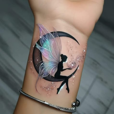 Wrap Around Neck Tattoos Women, Thigh Watercolor Tattoos Women, Fairy Dragonfly Tattoo, Tattoo Ideas Female Fairy, Fairy Outline Tattoo Simple, Enchanted Forest Tattoo Fairies, Fairy Wrist Tattoo, Fairy On Moon Tattoo, Small Female Tattoo Ideas