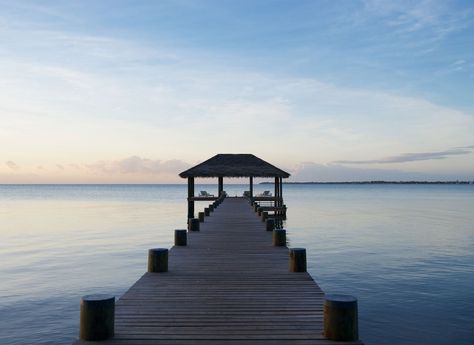 Placencia Peninsula, Belize - Best Beach Getaways Beyond Tulum | Jetsetter Boardwalk Beach Pictures, Ocean Reflection, Beach Dock, Belize Honeymoon, Boardwalk Beach, Living At The Beach, Placencia Belize, Boat Docks, Belize Vacations