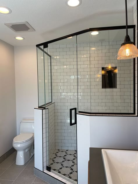 Save bathroom space with a neo angle shower door. Corner Shower Next To Toilet, Corner Shower With Two Shower Heads, Half Wall Corner Shower Ideas, Corner Steam Shower Ideas, Neo Angle Shower Bathroom Remodel, Prism Shower Ideas, Diagonal Shower Door, Pony Wall Corner Shower Ideas, Glass Shower Doors Corner