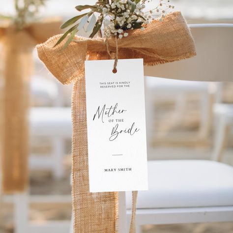 Ensure your guests know that certain seats are reserved at your wedding ceremony or reception with our Printable Reserved Seat Tags. These minimalist tags are the perfect addition to your special day, and with our editable Canva template, you can customize them to match your wedding style and theme. Whether you're reserving seats for the bridal party, family members, or special guests, our Reserved Seat Tags will ensure that everyone knows where they should sit. Simply print the tags at home or Modern Minimalist Wedding Ceremony, Minimalist Wedding Ceremony, Reserved Wedding Signs, Wedding Ceremony Seating, Wedding Pews, Reserved Seating, Modern Minimalist Wedding, Ceremony Seating, Family Sign