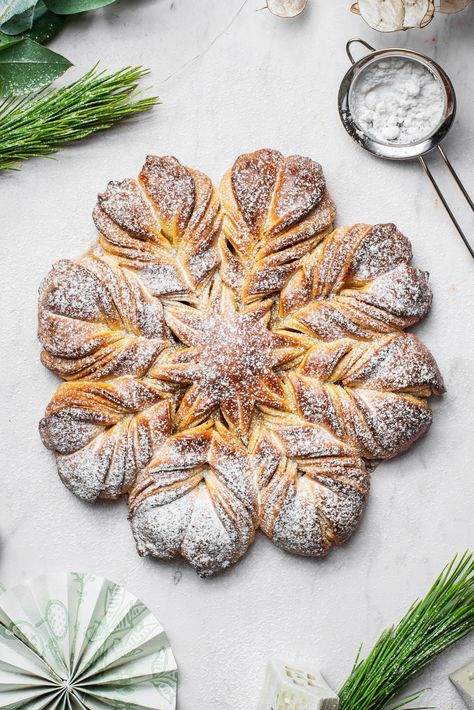 A naturally leavened holiday classic, this sourdough star bread is simply filled with butter and cinnamon sugar, but the possibilities are endless. It's surprisingly simple to make, with just layering and twisting! Sourdough Cinnamon Roll Star Bread, Sourdough Snowflake Bread, Baked Collective Sourdough Star Bread, Pantry Mama Star Bread, Sourdough Christmas Breakfast, New Year Sourdough Scoring, Christmas Tree Sourdough Loaf, Sourdough Christmas Star Bread, Gnome Sourdough Bread