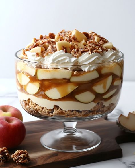 "This Caramel Apple Trifle is a big hit at our family gatherings! Everyone just loves the layers of yummy goodness and it disappears in a flash. Can't wait for you to try it!  Ingredients: - 4 cups of diced apples - 1 cup of caramel sauce - 2 cups of whipped cream For the rest of the ingredients and steps, Link in first comment [👇] [👇]  Prepare for layers of sweet heaven! You'll have crisp apples, creamy whipped cream, and rich caramel all in one bowl. It’s like a hug in dessert form!  #CaramelAppleTrifle #DessertLovers #FamilyFavorite #YummyTreats #FallRecipes" Apple Cheesecake Trifle, Apple Pie Trifle, Thanksgiving Trifle, Punch Bowl Cake Recipe, Caramel Apple Trifle, Punch Bowl Cake, Cheesecake Trifle, Sweet Apples, Caramel Apple Cheesecake