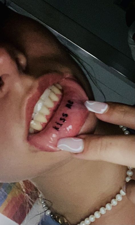 Lip tattoo idea kiss me Cool Lip Tattoos Ideas, Tattoo On Lips Ideas, Inside Mouth Tattoo, Inner Lip Tattoo Aesthetic, Inside Lip Tattoos Ideas, Mouth Tattoo Inner Lip, Lower Lip Tattoo, Tattoo On Lip, Inner Lip Tattoo Words