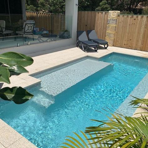 Beach Entry Pool Rectangle, Wooden Spa Bathroom Ideas, Small Pool Oasis Backyard, Corner Lot Pool Ideas, Sitting Pool Ideas, Rectangle Pool Small Backyard, Small Backyard Ideas Pool, Narrow Pool Designs, Pool Near House