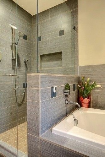 Small shower looks so much bigger with the glass wall! Just use a different pot for those flowers. Case A Un Piano, Bathroom Remodel Small Budget, Kids Bathroom Remodel, Mobile Home Bathroom, Guest Bathroom Remodel, Small Showers, Bathroom Tub, Diy Bathroom Remodel, Bathroom Remodel Shower