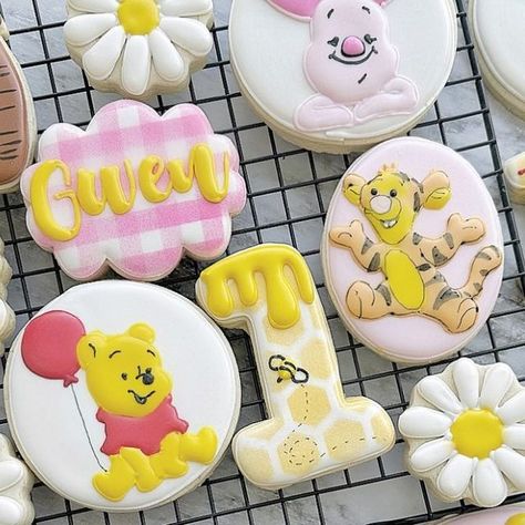 Erica on Instagram: "Sweet Winnie the Pooh set to celebrate Gwen’s first birthday!" Pooh First Birthday Girl, Winnie The Pooh Birthday Party Girl 1st, Whinney Pooh 1st Birthday, Winnie The Pooh Girl Birthday, Winnie The Pooh 1st Birthday Girl, Winnie The Pooh First Birthday Girl, Winnie The Pooh Cookies 1st Birthday, First Birthday Girl Winnie The Pooh, Winnie The Pooh Cookies Baby Girl