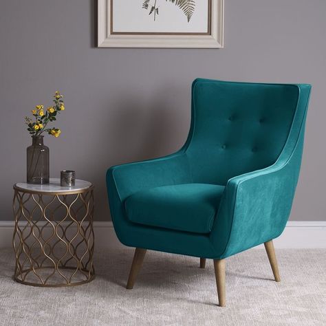 With its retro design, the Scott winged armchair is a very comfortable chair in which to sit and read a good book, add a scatter cushion or throw and then simply sink back into the chair and enjoy. The armchair's natural wood legs put a scandinavian twist on this modern design, upholstered in a fresh teal velvet that is sure to an edge of sophistication to any sitting room. Small Sofa Chair, Teal Chair, Practical Furniture, Stylish Sofas, Blue Interiors, Winged Armchair, Arm Chair Styles, Velvet Chairs, Teal Velvet