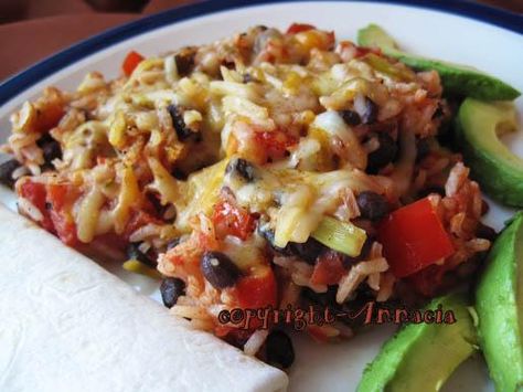 Black Beans and Rice Enchilada Rice Bake, Black Beans And Rice Recipe, Enchilada Rice, Rice Bake Recipes, Rice Black Beans, Rice Bake, Black Beans And Rice, Celebrity Recipes, Olive Relish