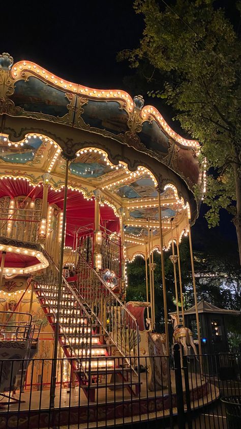 Lit carousel at Tivoli Gardens in Copenhagen. Hamburg Christmas, Copenhagen Denmark Aesthetic, Denmark Aesthetic, Tivoli Gardens Copenhagen, Tivoli Copenhagen, Copenhagen Aesthetic, Danish Aesthetic, Aesthetic Lights, Copenhagen Christmas