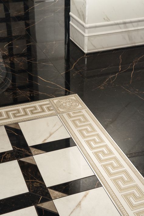 Versace Tiles soft and enveloping shapes, the finest raw materials, timeless colour combinations and the key decorative elements of the maison, such as the Medusa and the Greek fret pattern, produced using the very latest technology, characterize the Versace Home ceramic collections. Versace Tiles, Home Showroom, Designer Tiles, Marble Flooring Design, Floor Edging, Floor Tile Design, Marble Flooring, Feature Tiles, Versace Home