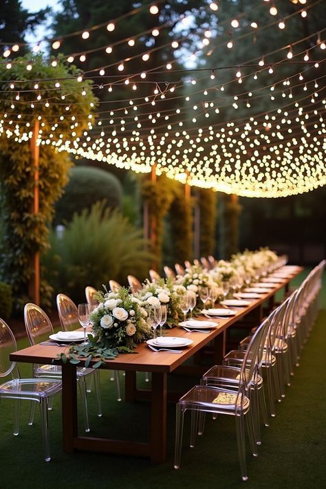 Long table under twinkling lights and greenery. Unlock a secret garden of enchanting wedding decor ideas that promise to transform your venue into a dreamy, botanical paradise. Garden Wedding Long Table, Outdoor Wedding Lighting Ideas Backyards, Lights Outside Wedding, Twinkle Light Weddings, Backyard Wedding Dinner, Wedding Lights Outdoor, Garden Wedding Decor Ideas, Ethereal Garden Wedding, Enchanted Wedding Decor